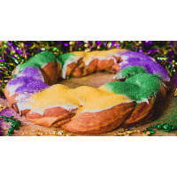 Cream Cheese King Cake with icing on side