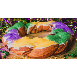 Praline Cream Cheese King Cake with icing on side